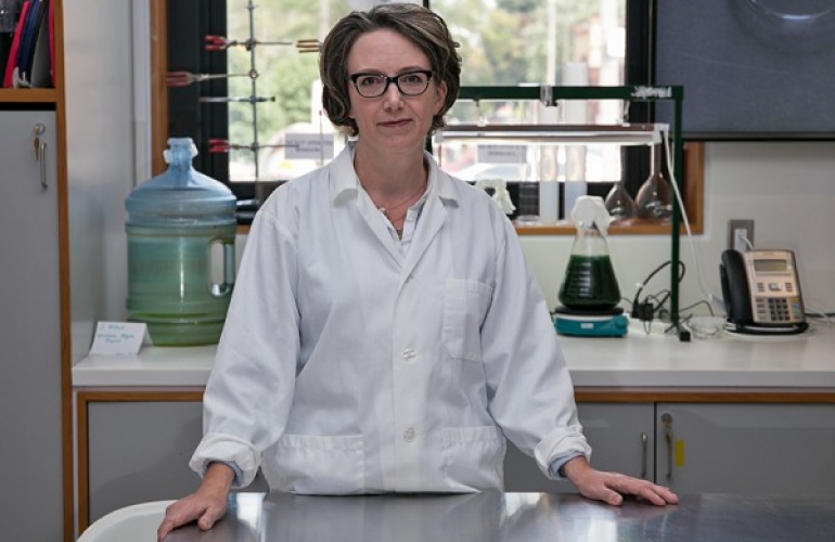 Image of Dr. Jennifer Willet in a lab wearing a la