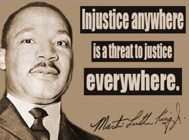 Photo of MLK, Jr. with quote "Injustice anywhere is a threat to justice everywhere."