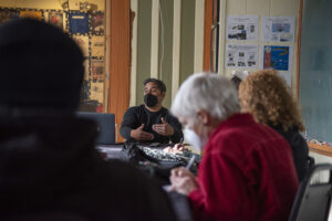 Thumbnail of http://Bhawin%20Suchak%20and%20Ira%20McKinley%20hold%20a%20meeting%20to%20discuss%20their%20film,%20answer%20audience's%20questions.