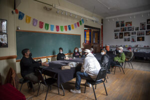 Thumbnail of http://Bhawin%20Suchak%20and%20Ira%20McKinley%20hold%20a%20meeting%20to%20discuss%20their%20film,%20answer%20audience's%20questions.